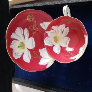 Vintage Occupied Japan cup and saucer floral pink and white. In excellent condit
